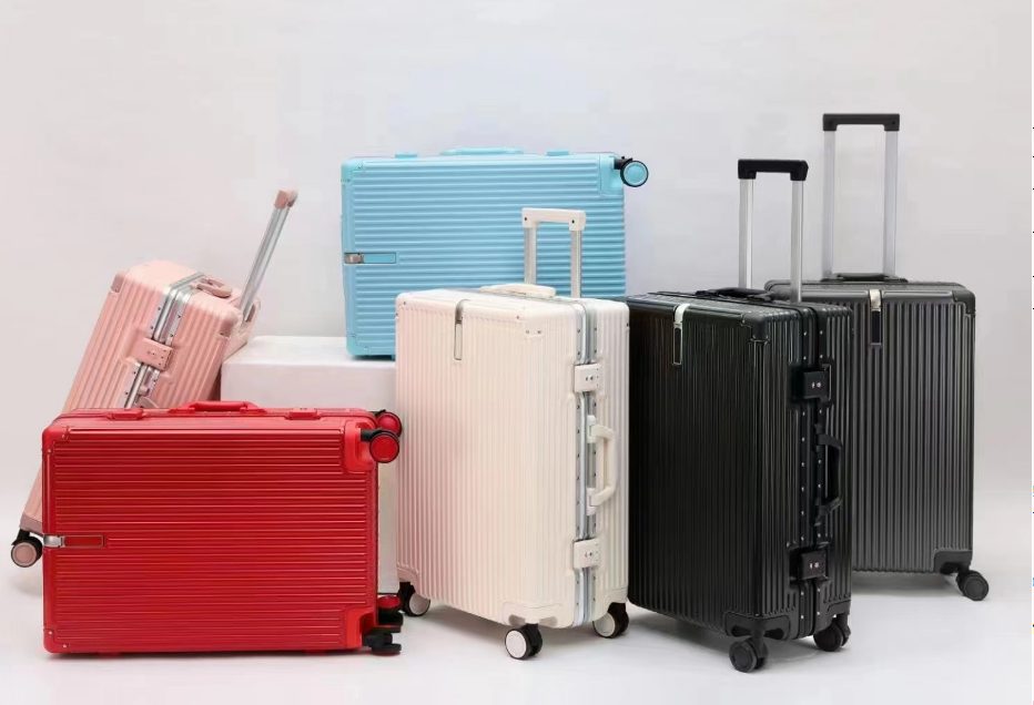 MODINA hard-shell luggage range in assorted colors, studio group photo